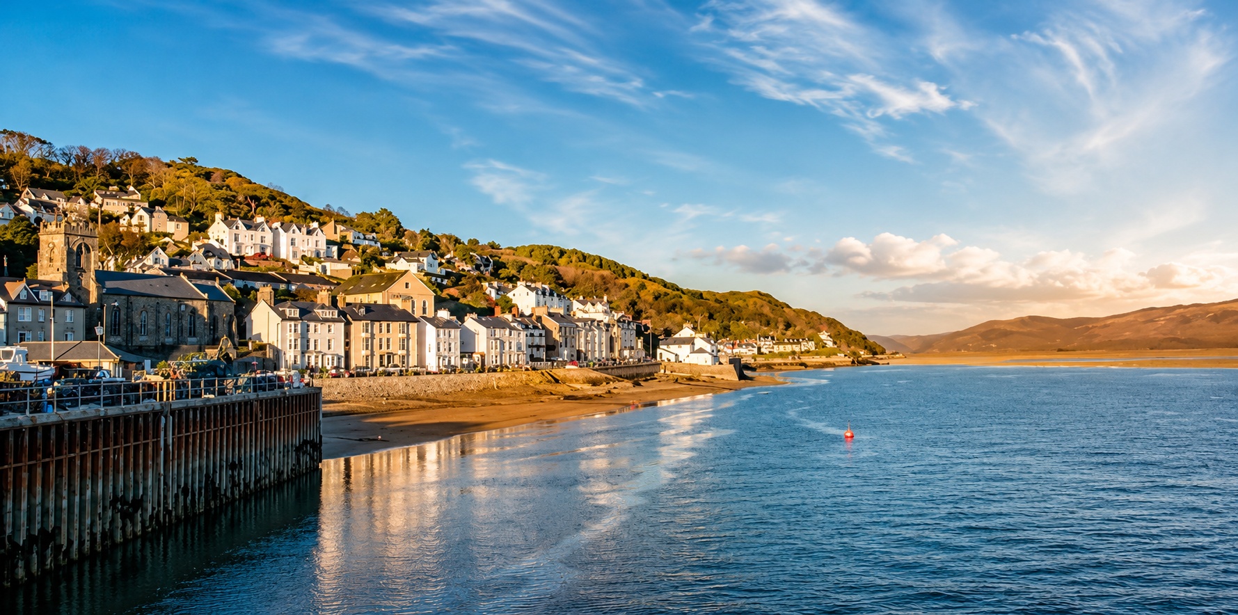 Beautiful Aberdyfi coastal village and estuary at golden hour — home of Blas café in Wales