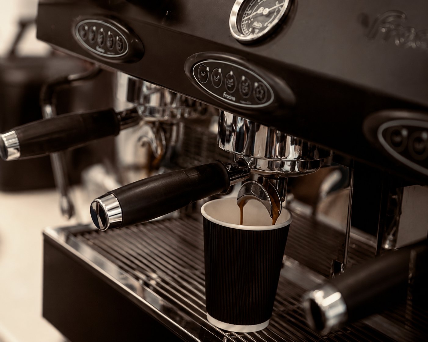 Fresh espresso extracting on the Fracine machine at Blas Aberdyfi — Colombian/Welsh blend barista coffee in Aberdyfi, Wales